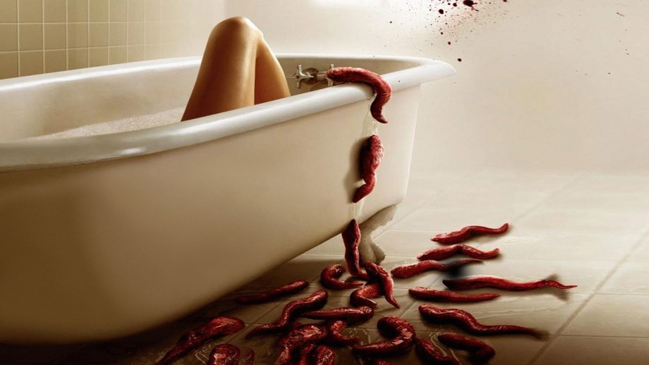 Cartel de la película La Plaga (Slither) (2006) de James Gunn